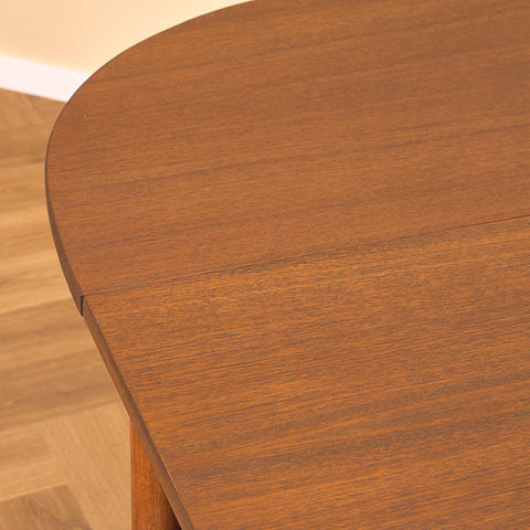 Danskt matbord med 4 iläggsskivor i teak "Arne Vodder-stil"