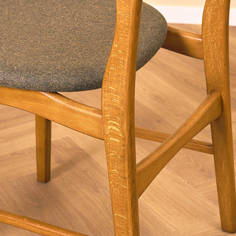 Dansk matstol i teak och ek av Ib Kofod-Larsen