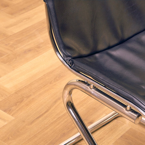 Mid-century dining chairs in chrome and leather