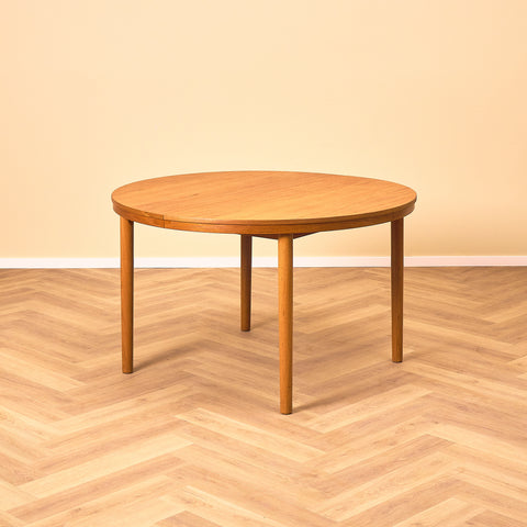Swedish round dining table in teak