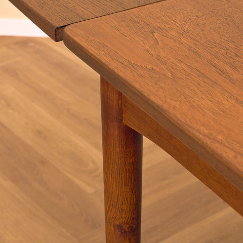 Danish dining table in teak and oak