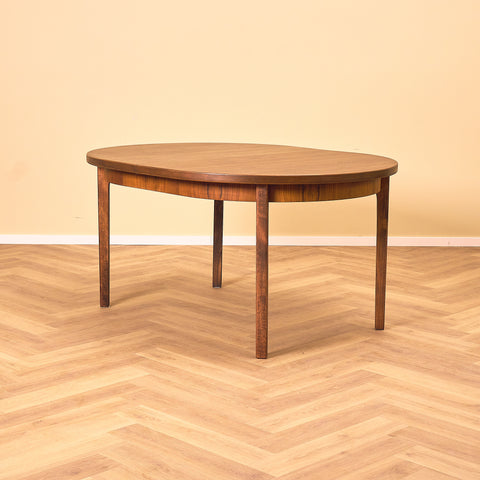 Danish oval dining table in stained teak and beech