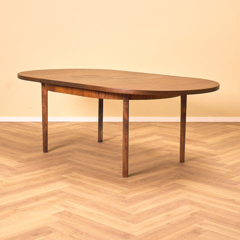 Danish oval dining table in stained teak and beech