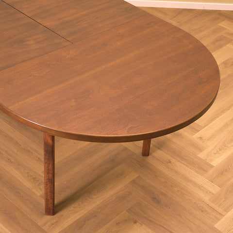 Danish oval dining table in stained teak and beech
