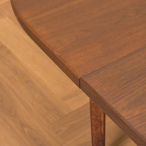 Danish oval dining table in stained teak and beech