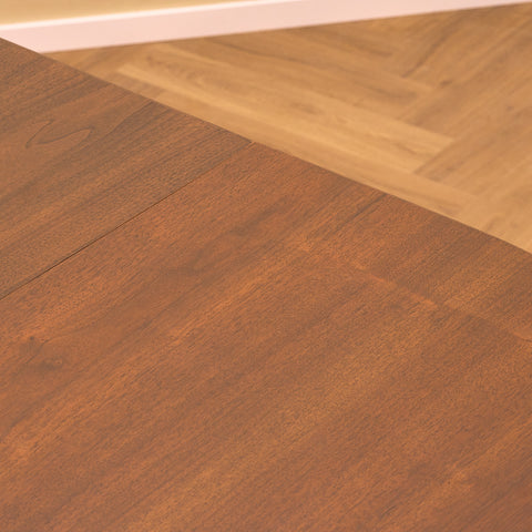 Danish oval dining table in stained teak and beech