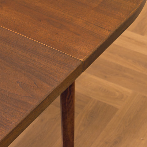 Danish oval dining table in stained teak and beech