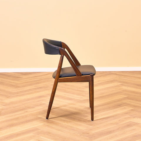 Danish dining chairs in Santos rosewood by Kai Kristiansen for Schou Andersen, model 31