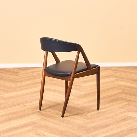 Danish dining chairs in Santos rosewood by Kai Kristiansen for Schou Andersen, model 31