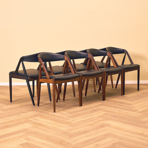 Danish dining chairs in Santos rosewood by Kai Kristiansen for Schou Andersen, model 31