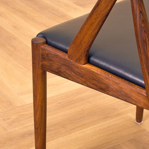 Danish dining chairs in Santos rosewood by Kai Kristiansen for Schou Andersen, model 31