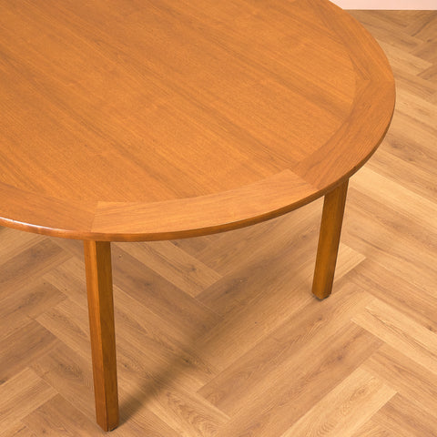 Danish round dining table in teak