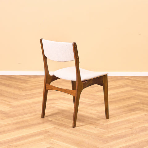 Danish set of 4 dining chairs in solid walnut by Erik Buch