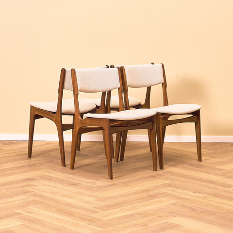 Danish set of 4 dining chairs in solid walnut by Erik Buch