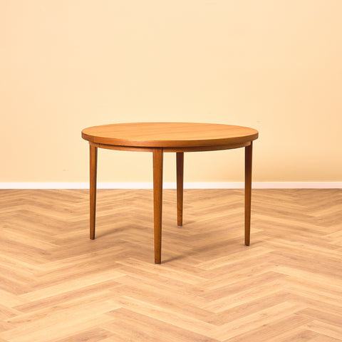 Danish round dining table in teak