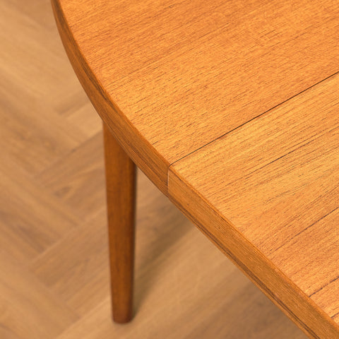 Danish round dining table in teak