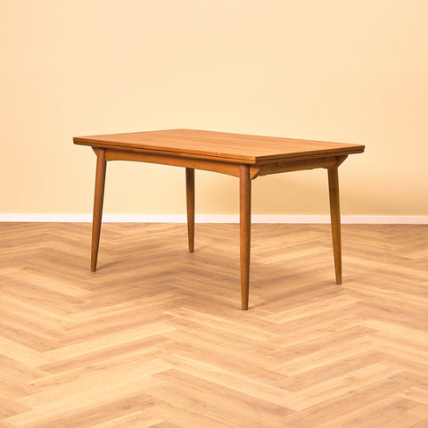 Danish dining table in teak and oak