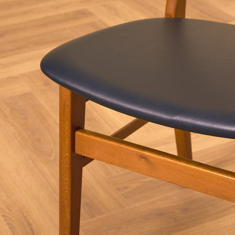 Danish dining chairs in teak & beech by Farstrup, model '210'