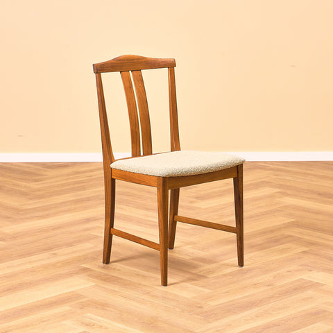 Swedish dining chairs in walnut by Karl Erik Ekselius