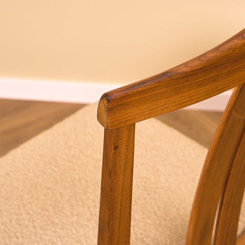 Swedish dining chairs in walnut by Karl Erik Ekselius