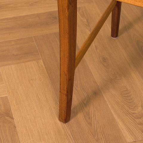 Swedish dining chairs in walnut by Karl Erik Ekselius