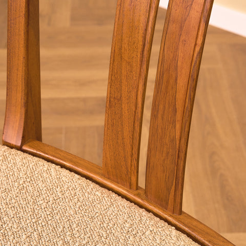 Swedish dining chairs in walnut by Karl Erik Ekselius