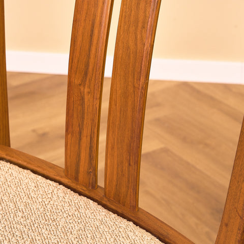 Swedish dining chairs in walnut by Karl Erik Ekselius