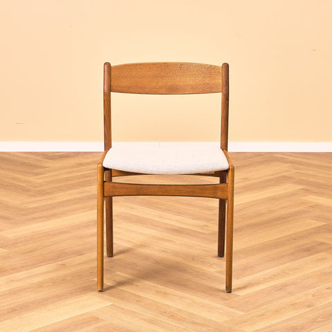 Danish dining chairs in oak by Erik Kirkegaard