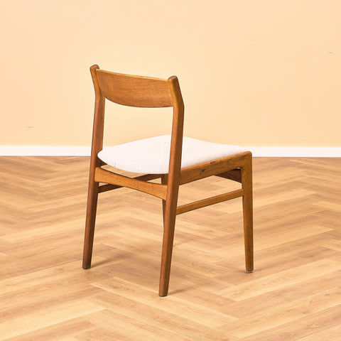 Danish dining chairs in oak by Erik Kirkegaard