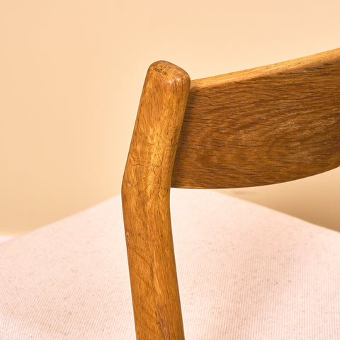 Danish dining chairs in oak by Erik Kirkegaard