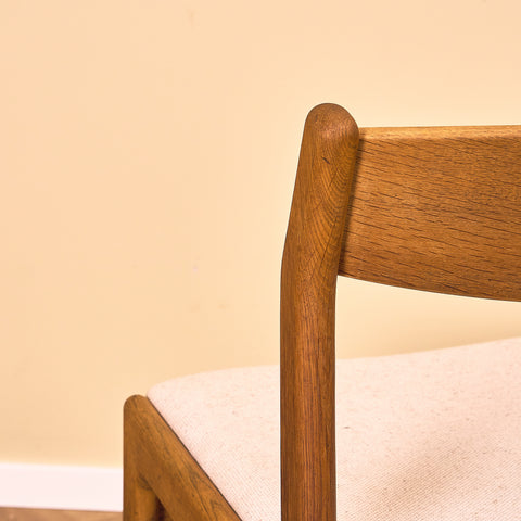 Danish dining chairs in oak by Erik Kirkegaard