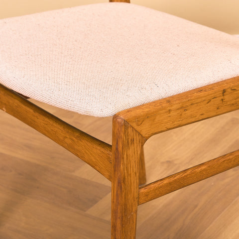 Danish dining chairs in oak by Erik Kirkegaard