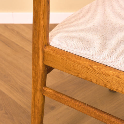 Danish dining chairs in oak by Erik Kirkegaard