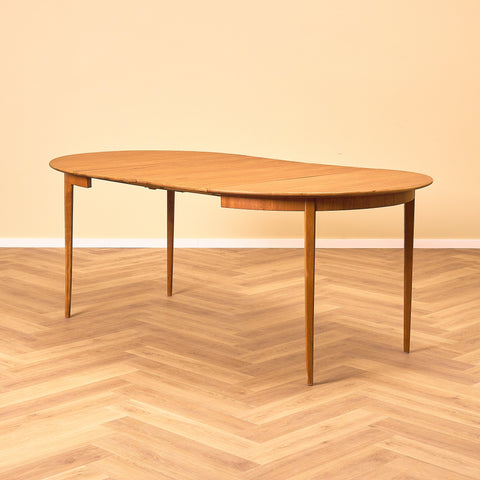 Swedish round dining table in teak and beech