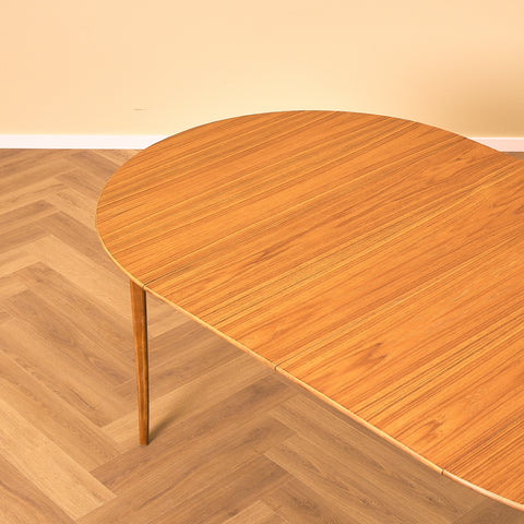 Swedish round dining table in teak and beech