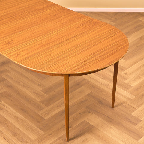 Swedish round dining table in teak and beech