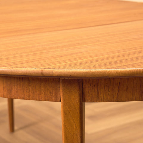 Swedish round dining table in teak and beech