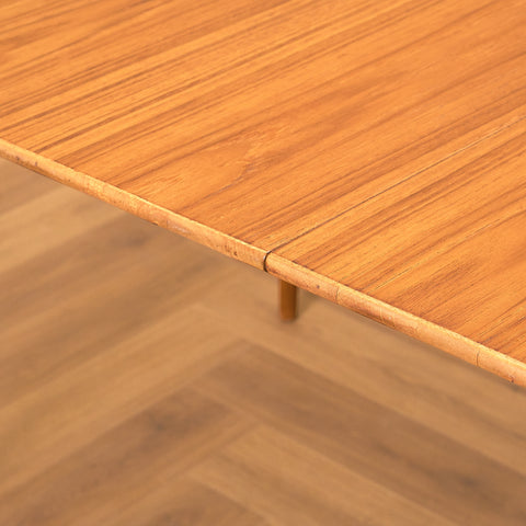 Swedish round dining table in teak and beech