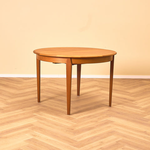 Danish round dining table in teak