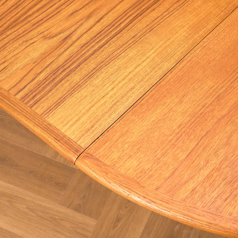 Danish round dining table in teak