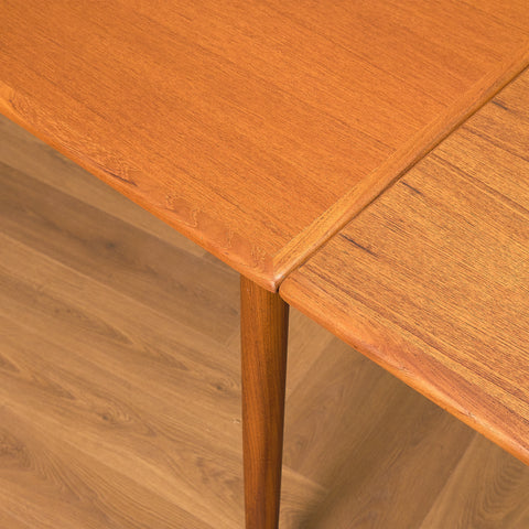 Danish dining table in teak and walnut