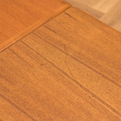 Danish dining table in teak and walnut