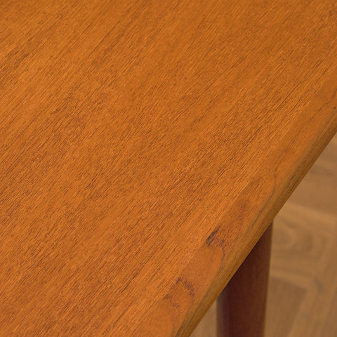 Danish dining table in teak and walnut