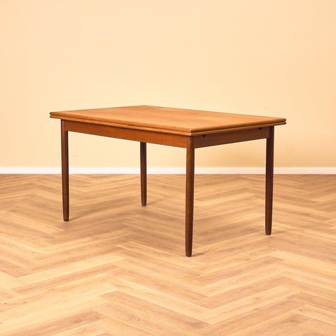 Danish dining table in teak and walnut