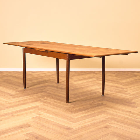 Danish dining table in teak and walnut