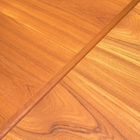 Danish dining table in teak and walnut