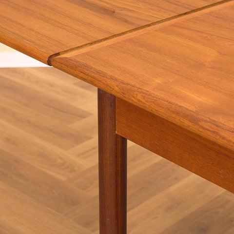 Danish dining table in teak and walnut