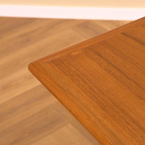 Danish dining table in teak and walnut