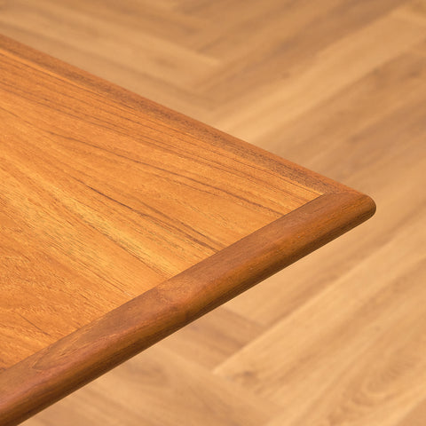 Danish dining table in teak and walnut