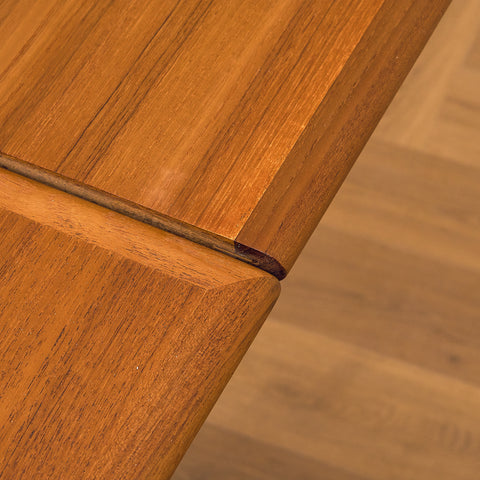 Danish dining table in teak and walnut